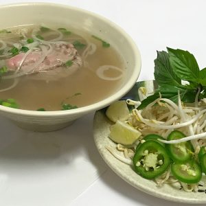 Pho Tai. Eye-round steak with Vietnamese noodle soup stock simmered for hours and pho noodles