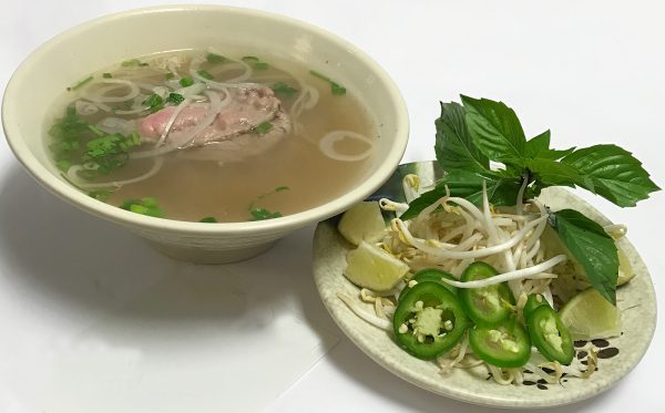 Pho Tai. Eye-round steak with Vietnamese noodle soup stock simmered for hours and pho noodles