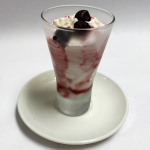 Coppa Spagnola, Vanilla and Amarena cherry gelato swirled together,topped with real Amarena cherries.